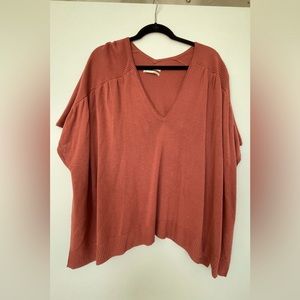 by Anthropologie sweater.  Full, comfortable. Can be worn off one shoulder